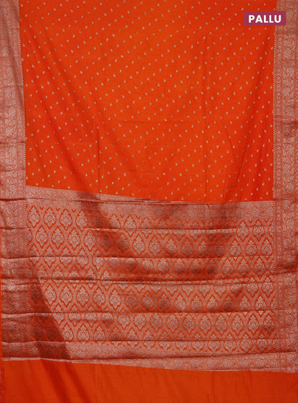 Semi chiniya saree orange with woven buttas and woven border