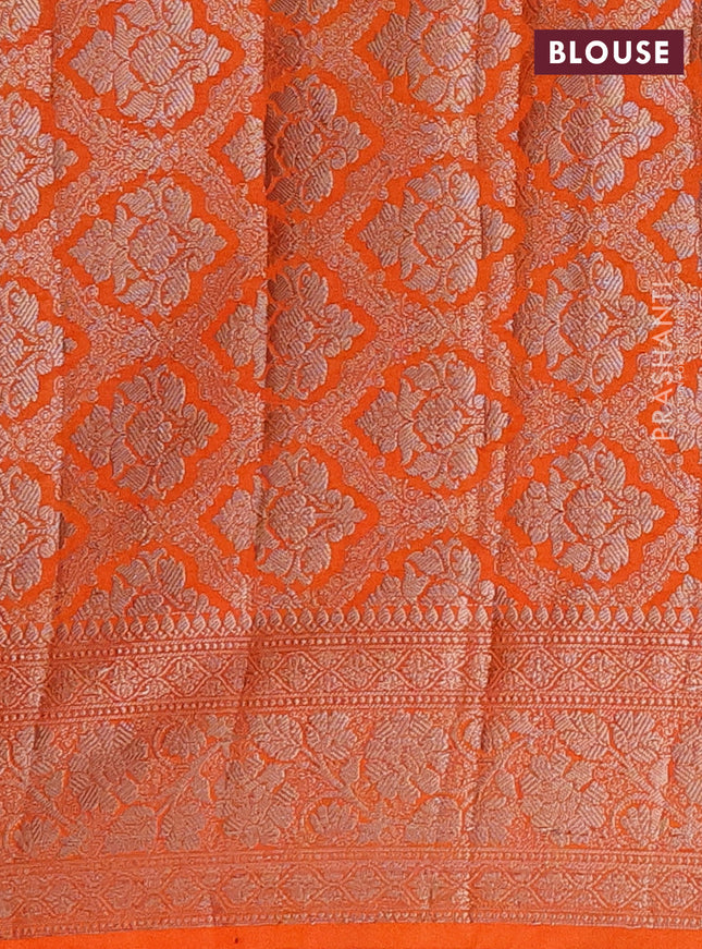 Semi chiniya saree orange with woven buttas and woven border