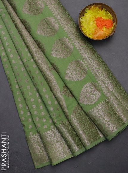 Semi chiniya saree pastel green with woven buttas and woven border