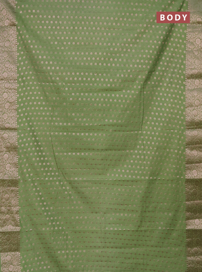 Semi chiniya saree pastel green with woven buttas and woven border
