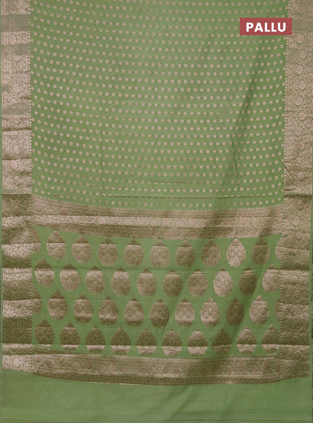 Semi chiniya saree pastel green with woven buttas and woven border