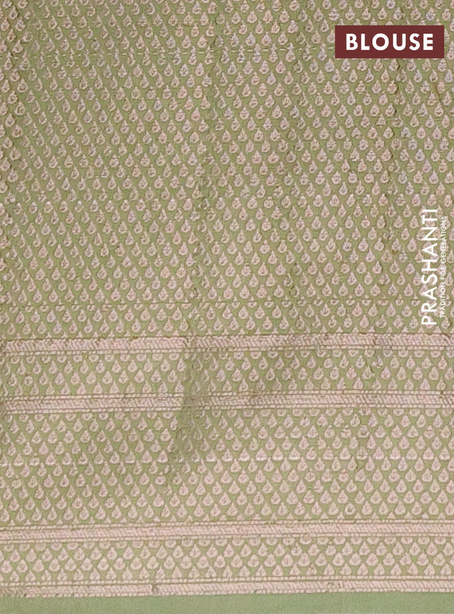 Semi chiniya saree pastel green with woven buttas and woven border