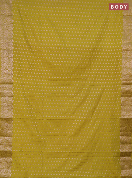 Semi chiniya saree light green with woven buttas and woven border