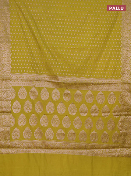 Semi chiniya saree light green with woven buttas and woven border