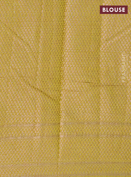 Semi chiniya saree light green with woven buttas and woven border