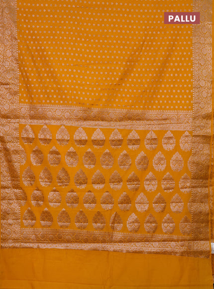 Semi chiniya saree mango yellow with woven buttas and woven border