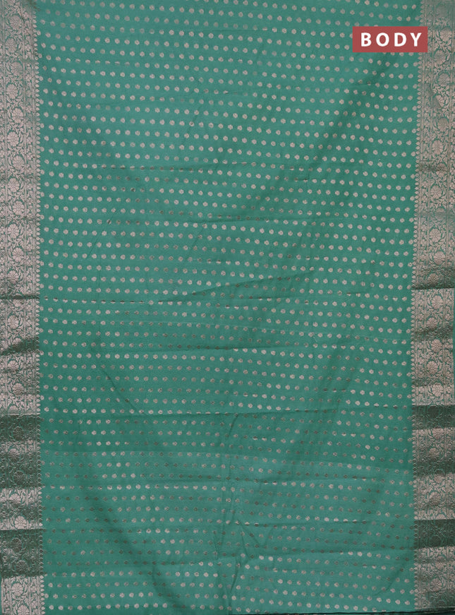 Semi chiniya saree teal shade with woven buttas and woven border