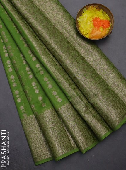 Semi chiniya saree green with woven buttas and woven border