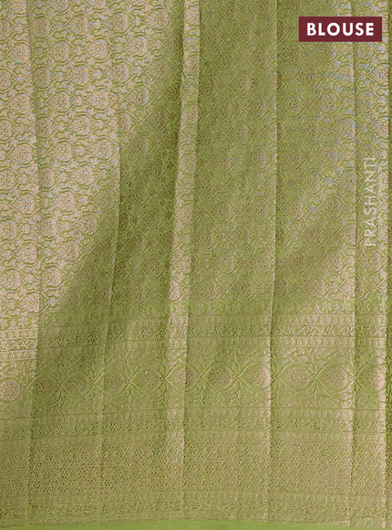 Semi chiniya saree green with woven buttas and woven border