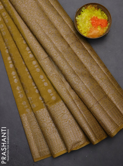 Semi chiniya saree yellow with woven buttas and woven border