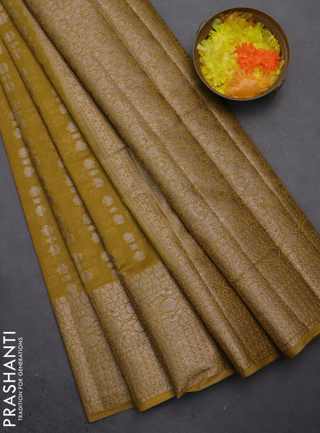 Semi chiniya saree yellow with woven buttas and woven border