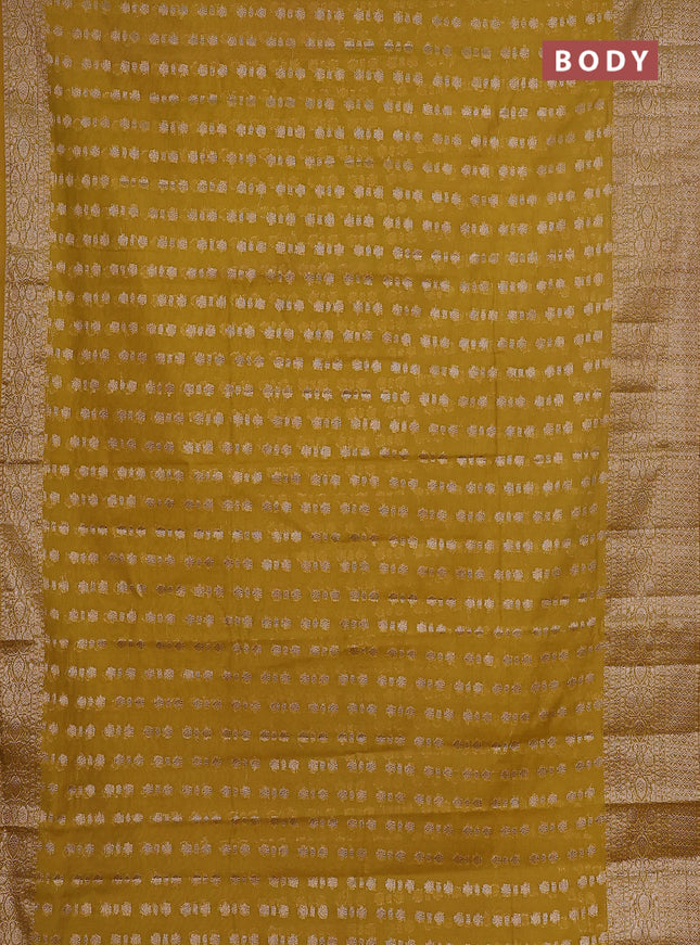 Semi chiniya saree yellow with woven buttas and woven border