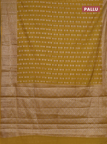 Semi chiniya saree yellow with woven buttas and woven border