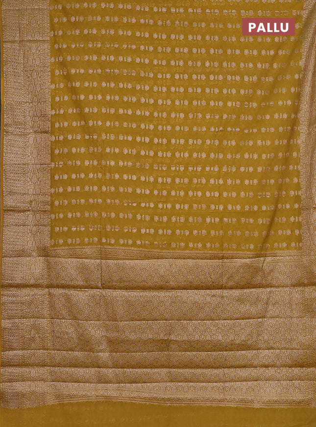 Semi chiniya saree yellow with woven buttas and woven border