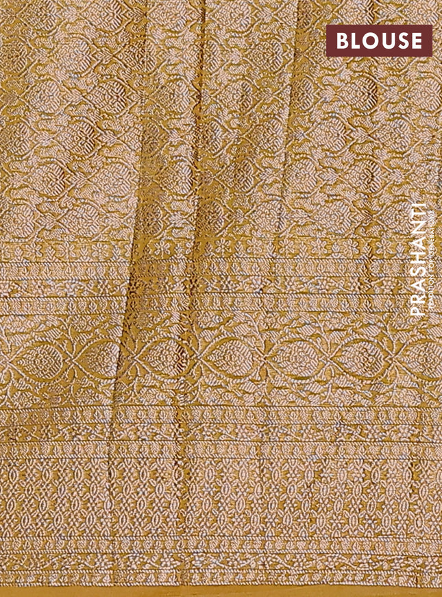 Semi chiniya saree yellow with woven buttas and woven border