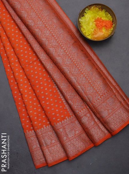 Semi chiniya saree orange with woven buttas and woven border