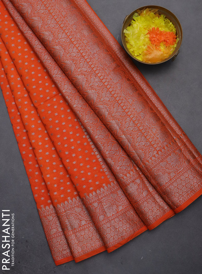 Semi chiniya saree orange with woven buttas and woven border