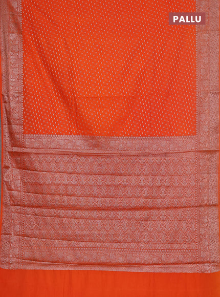 Semi chiniya saree orange with woven buttas and woven border