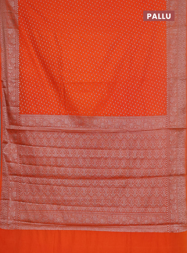 Semi chiniya saree orange with woven buttas and woven border