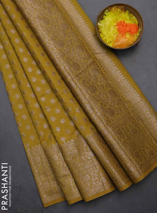 Semi chiniya saree yellow with woven buttas and woven border
