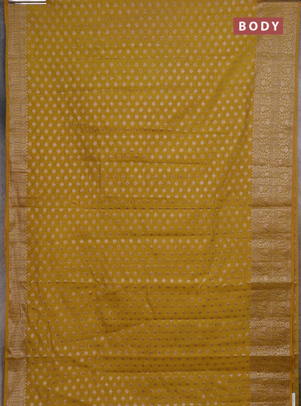 Semi chiniya saree yellow with woven buttas and woven border