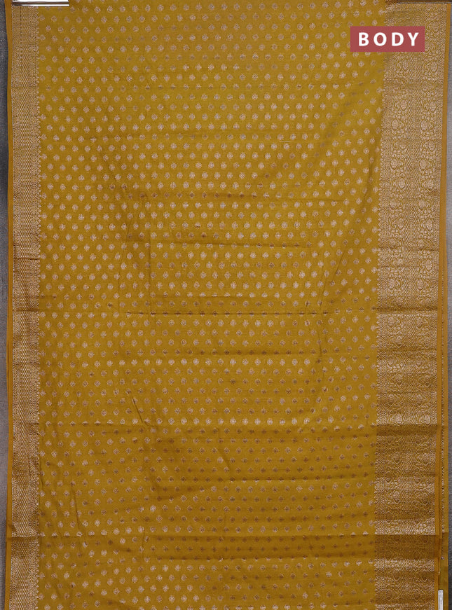 Semi chiniya saree yellow with woven buttas and woven border