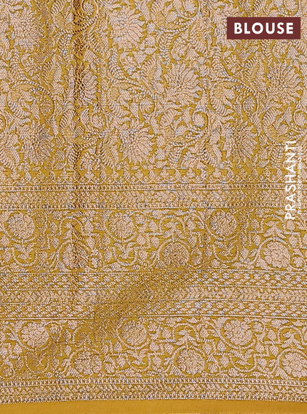Semi chiniya saree yellow with woven buttas and woven border