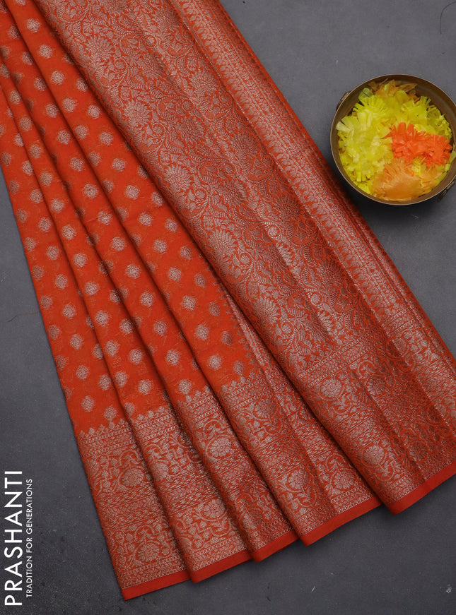 Semi chiniya saree orange with woven buttas and woven border