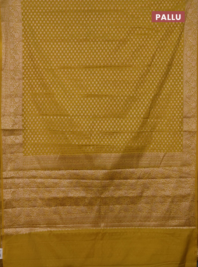 Semi chiniya saree yellow with woven buttas and woven border