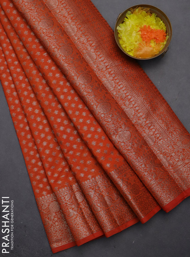 Semi chiniya saree orange with woven buttas and woven border