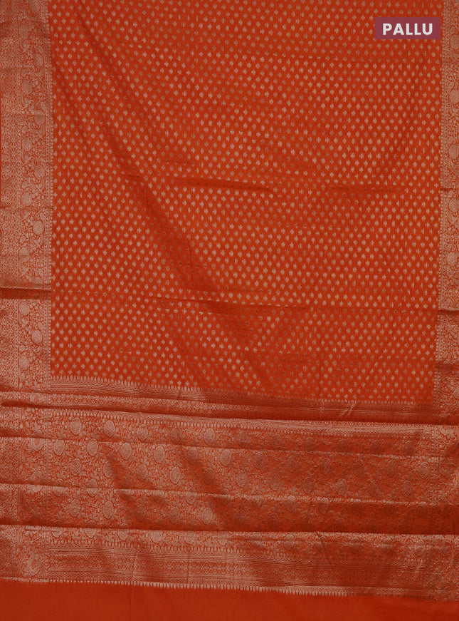 Semi chiniya saree orange with woven buttas and woven border