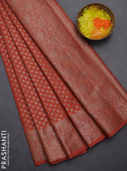 Semi chiniya saree orange with woven buttas and woven border