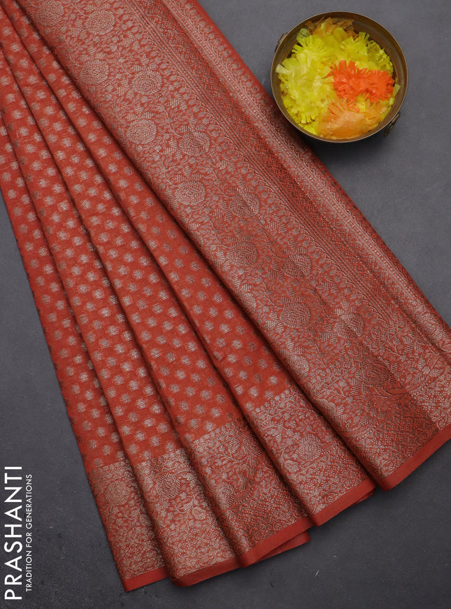 Semi chiniya saree orange with woven buttas and woven border