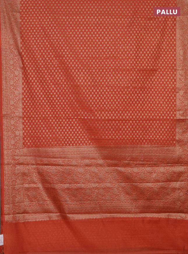 Semi chiniya saree orange with woven buttas and woven border