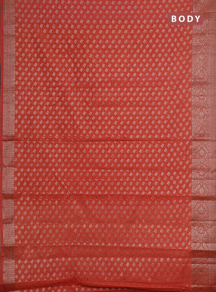 Semi chiniya saree peach orange with woven buttas and woven border