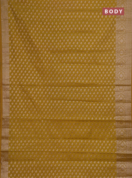 Semi chiniya saree mustard shade with woven buttas and woven border