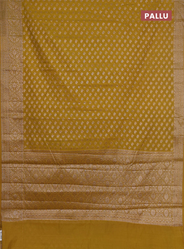 Semi chiniya saree mustard shade with woven buttas and woven border