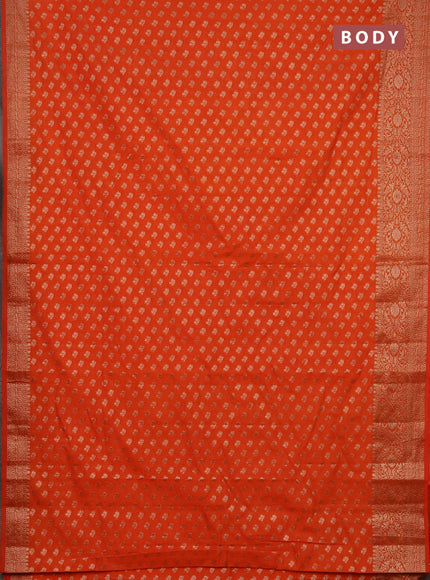 Semi chiniya saree orange with woven buttas and woven border
