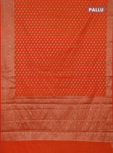 Semi chiniya saree orange with woven buttas and woven border