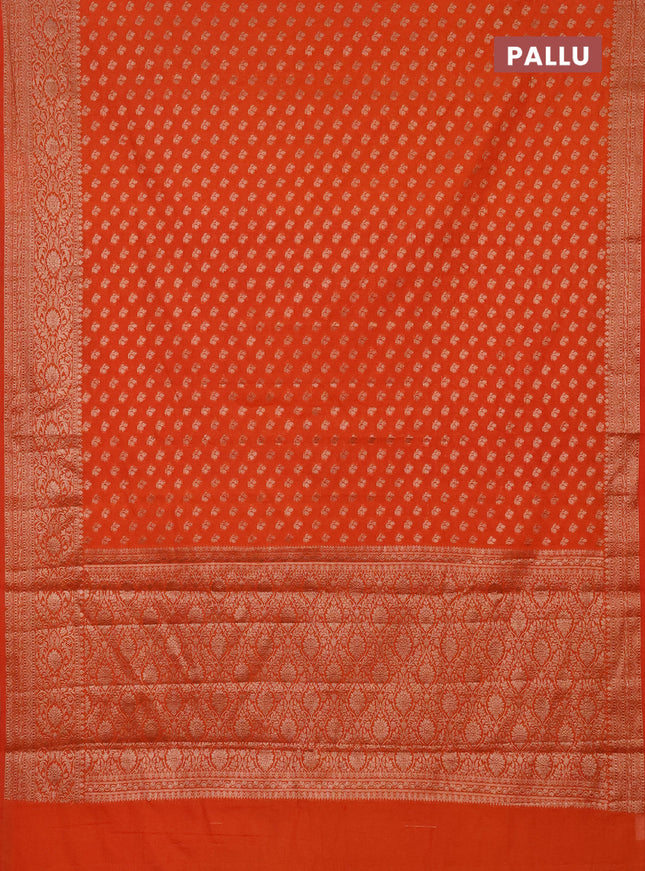 Semi chiniya saree orange with woven buttas and woven border