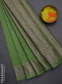 Semi chiniya saree green with woven buttas and woven border