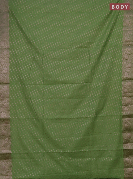 Semi chiniya saree green with woven buttas and woven border