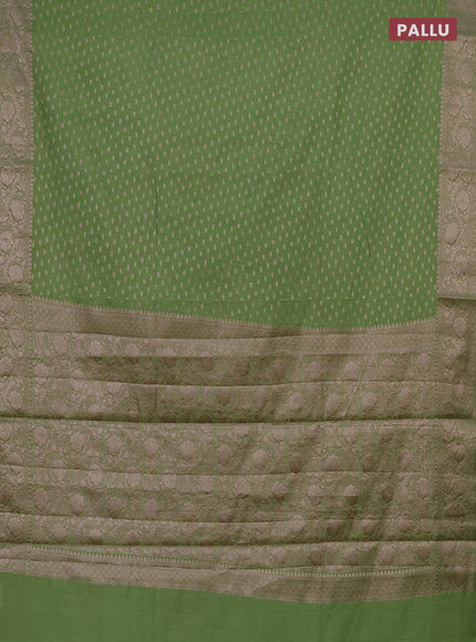 Semi chiniya saree green with woven buttas and woven border