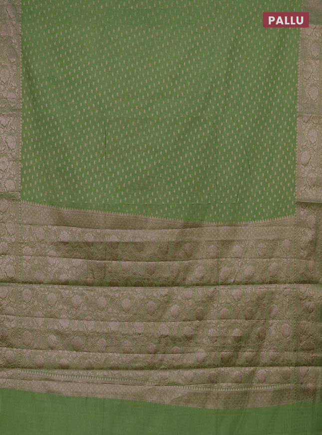 Semi chiniya saree green with woven buttas and woven border