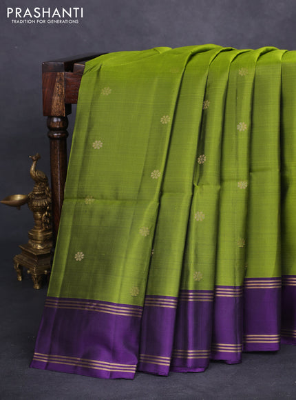 Pure soft silk saree light green and purple with zari woven floral buttas and rettapet zari woven border