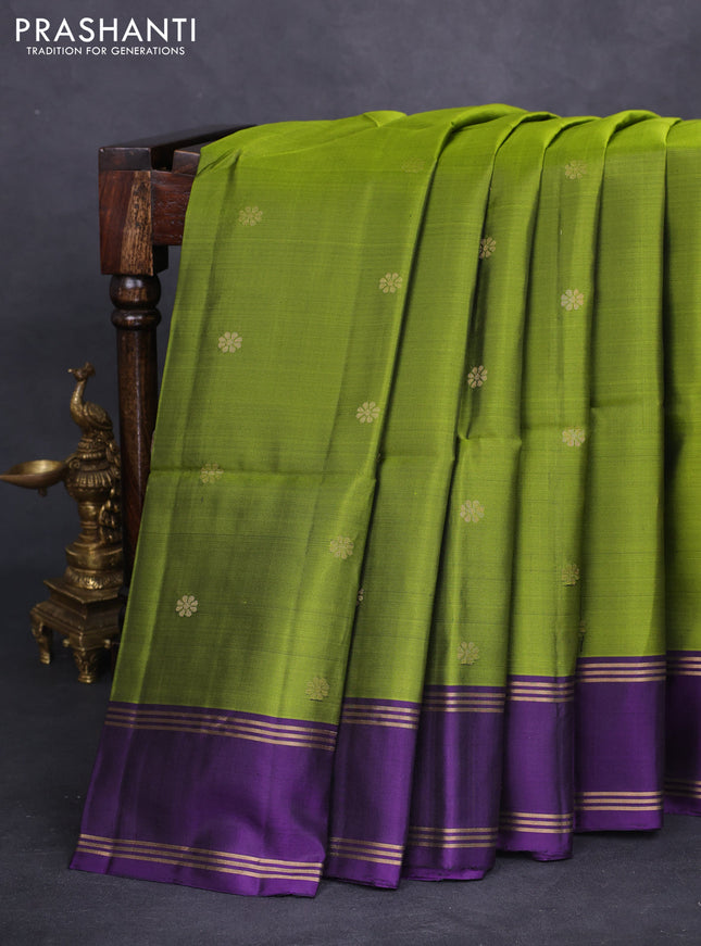 Pure soft silk saree light green and purple with zari woven floral buttas and rettapet zari woven border