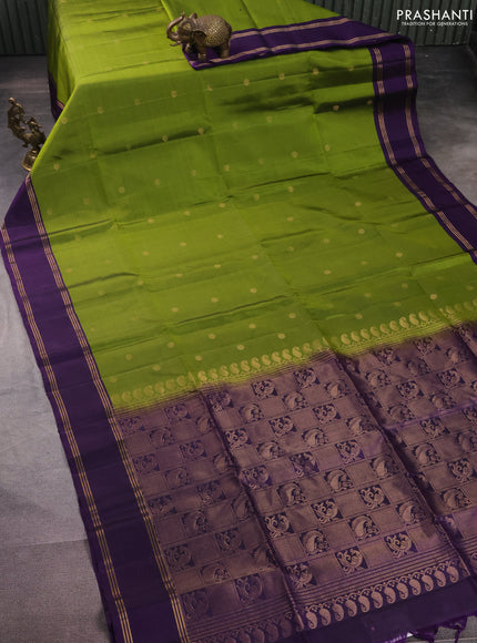 Pure soft silk saree light green and purple with zari woven floral buttas and rettapet zari woven border