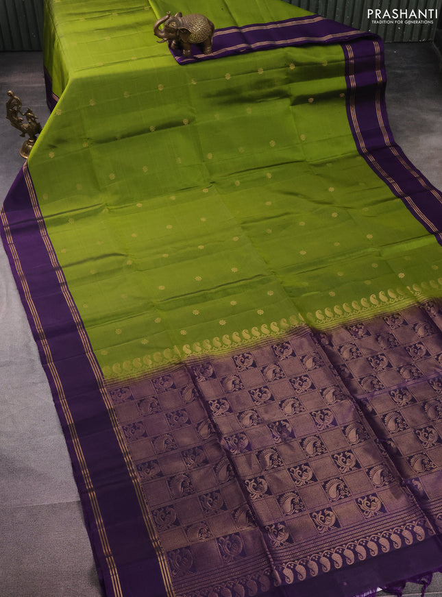 Pure soft silk saree light green and purple with zari woven floral buttas and rettapet zari woven border