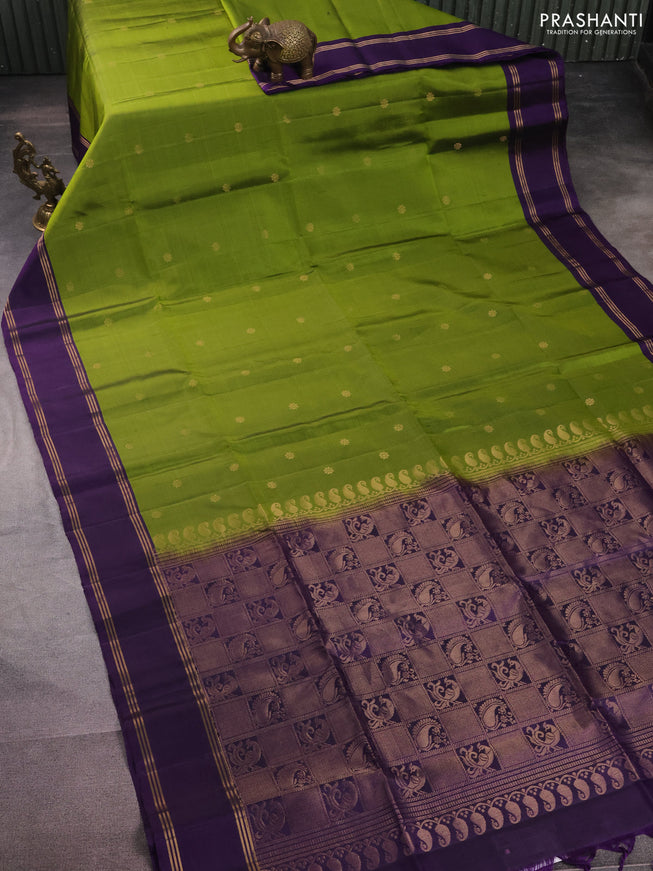 Pure soft silk saree light green and purple with zari woven floral buttas and rettapet zari woven border
