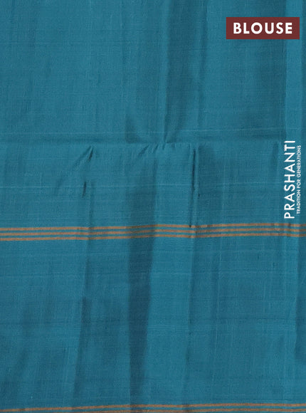 Pure soft silk saree black and teal blue with allover zari weaves and rettapet zari woven border